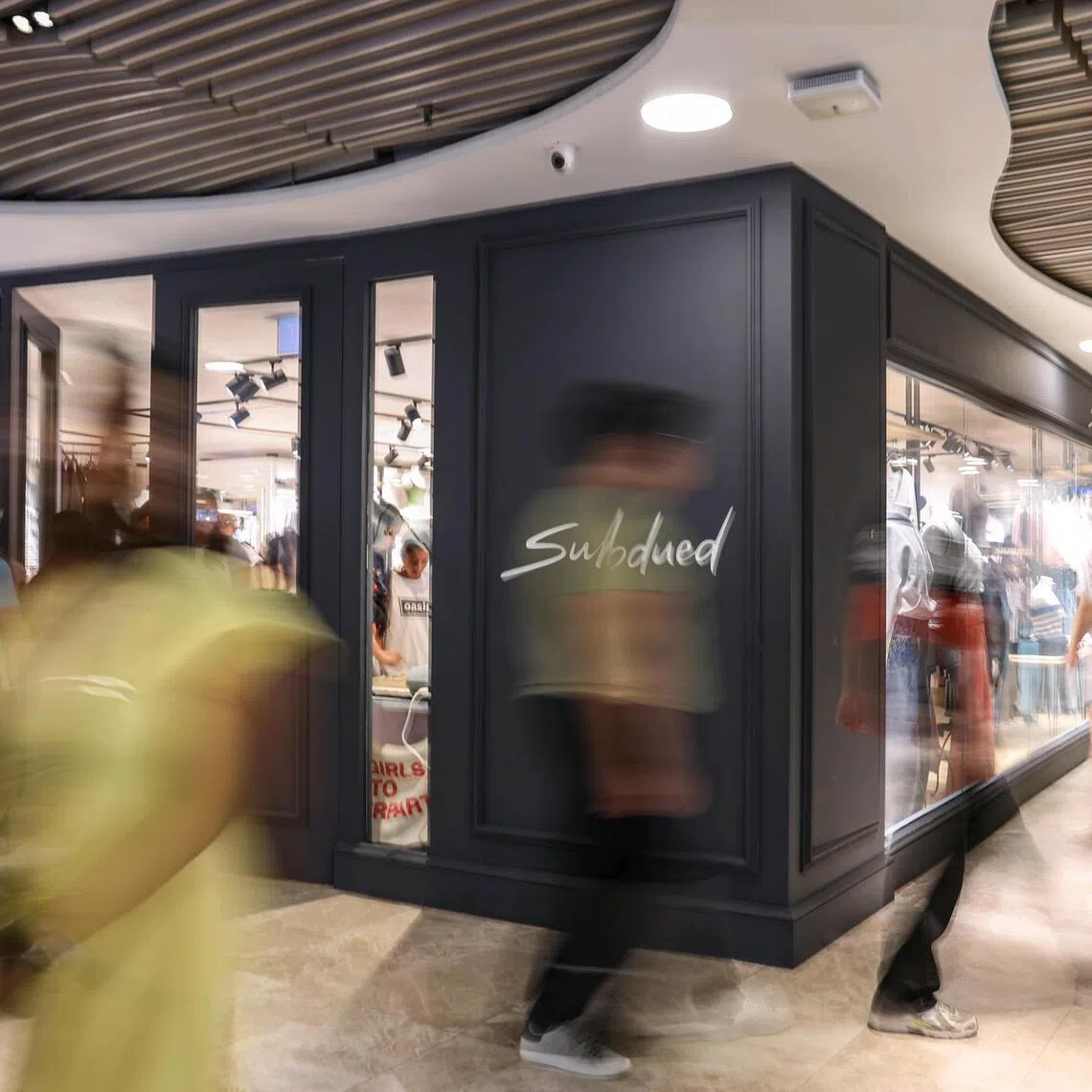 Shoppers throng the Subdued clothing store at Wheelock Place on April 18, 2026. 