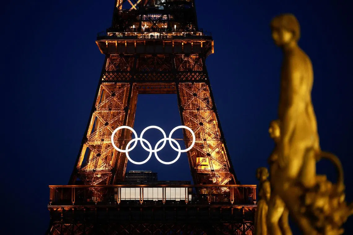 The Olympic rings are displayed on the first floor of the Eiffel Tower ahead of the Paris 2024 Games.
