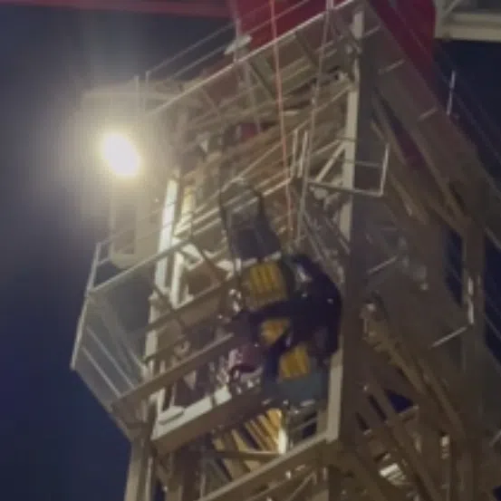 The worker was given water and oxygen by the SCDF personnel, before he was secured to a stretcher and lowered to the ground.