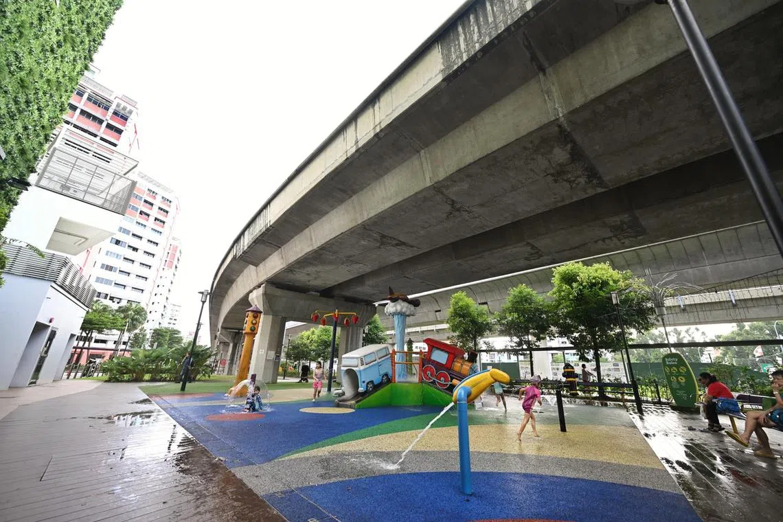 A water park below a viaduct outside Choa Chu Kang MRT station.