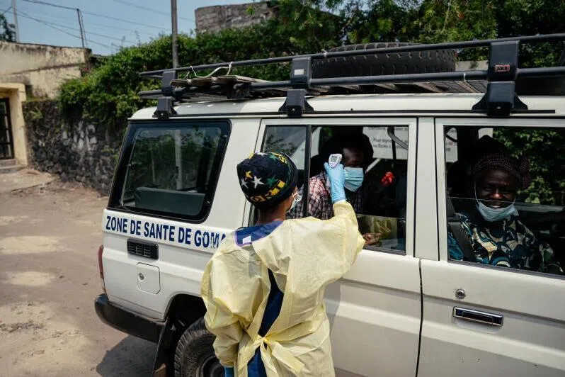 A health worker screening visitors to the  Kyeshero Hospital in Goma in the Democratic Republic of Congo on May 18 as part of Ebola prevention measures.
