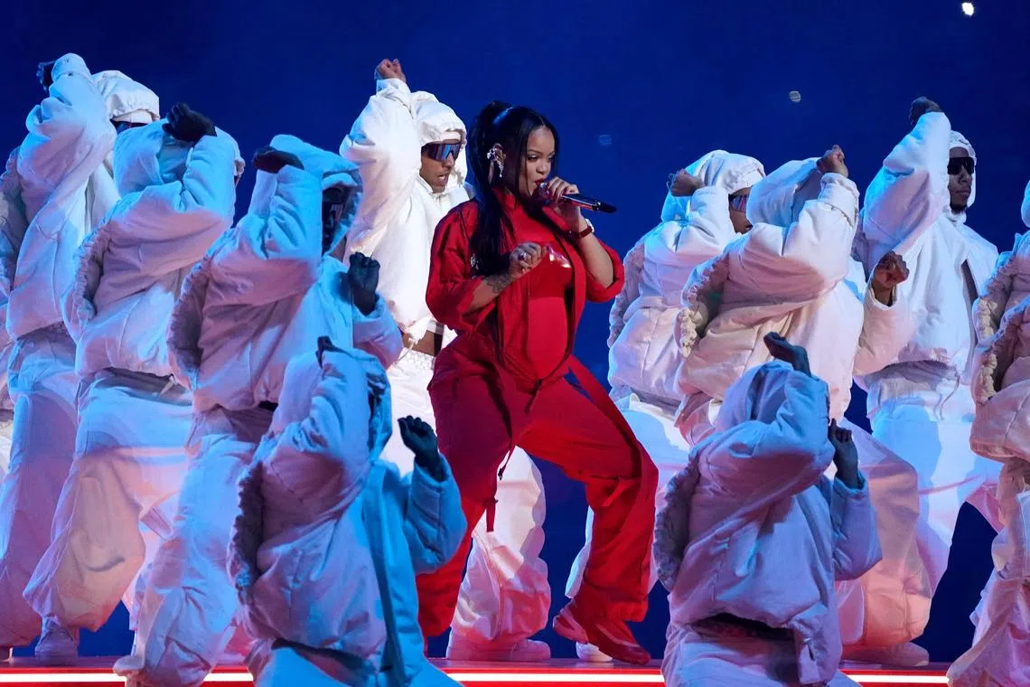 TOPSHOT - Barbadian singer Rihanna performs during the halftime show of Super Bowl LVII between the Kansas City Chiefs and the Philadelphia Eagles at State Farm Stadium in Glendale, Arizona, on February 12, 2023. (Photo by TIMOTHY A. CLARY / AFP)