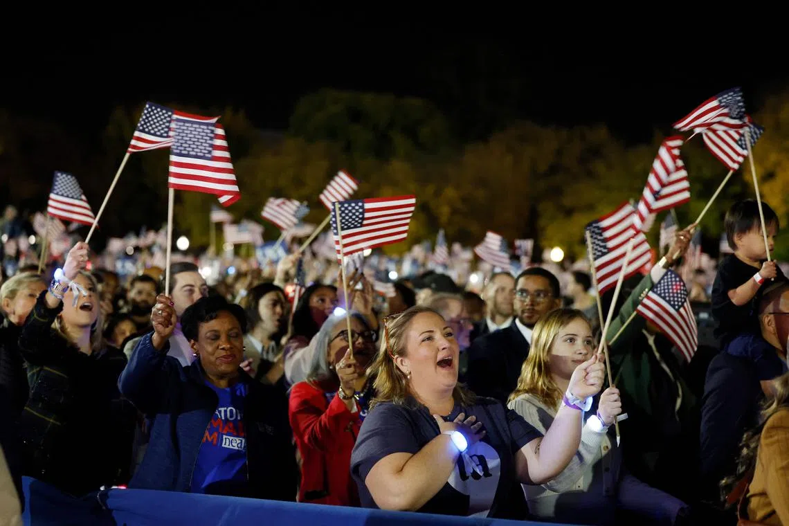 Supporters attend Democratic presidential nominee US Vice President Kamala Harris's campaign rally at the Ellipse on Oct 29 in Washington, DC. 