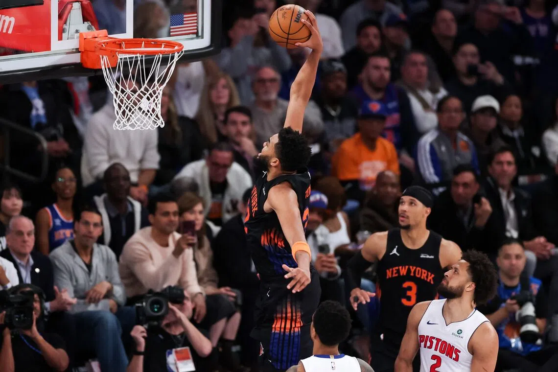 Top-scorer Karl-Anthony Towns of the New York Knicks dunks the ball during the third quarter against the Detroit Pistons at Madison Square Garden on Oct 27.