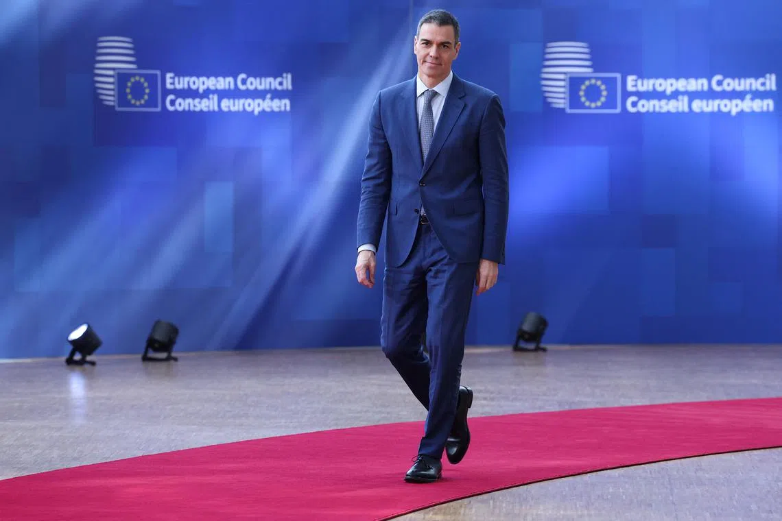 Spanish Prime Minister Pedro Sanchez walks to attend a European Union summit in Brussels, Belgium March 20, 2025. REUTERS/Yves Herman/File Photo