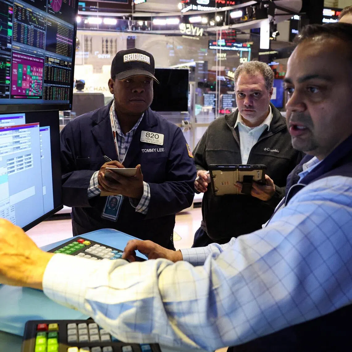 Traders working on the floor of the New York Stock Exchange, in New York City, on March 5.   