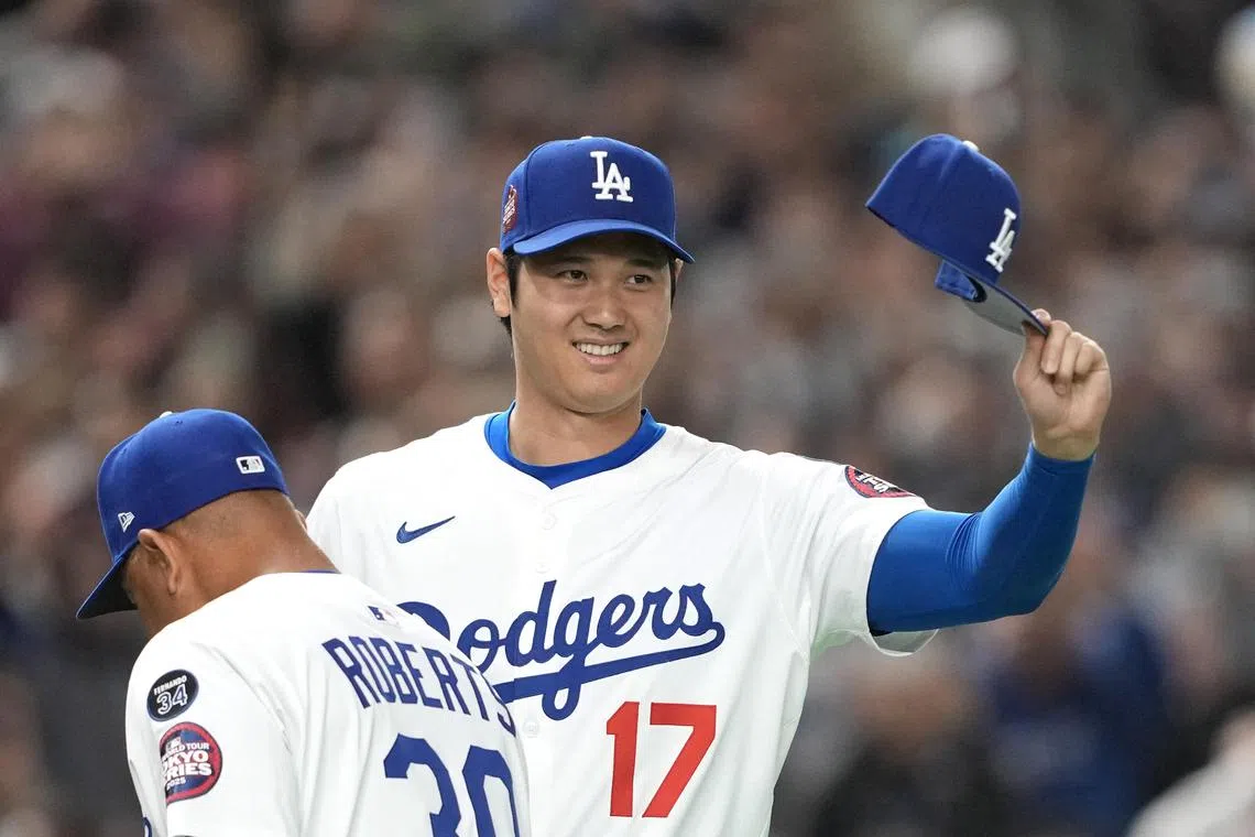 Los Angeles Dodgers designated hitter Shohei Ohtani gesturing before the game against the Hanshin Tigers at Tokyo Dome in Bunkyo, Tokyo, Japan on March 16.