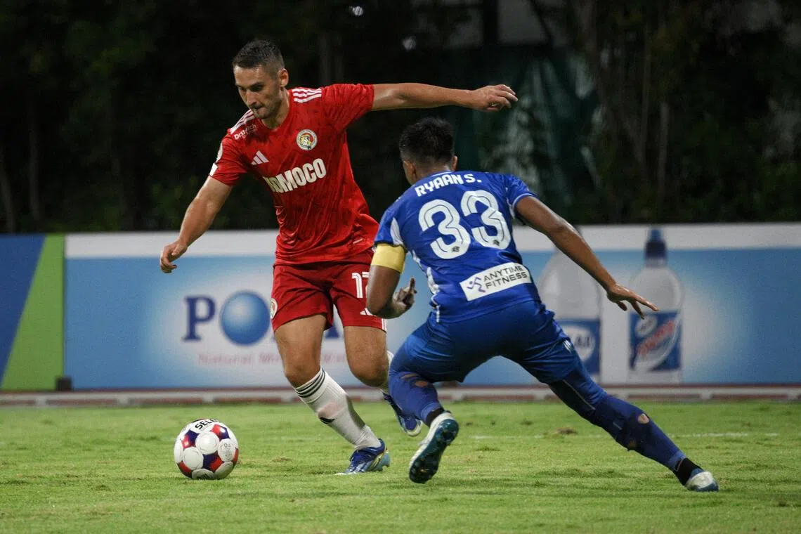 Tin Matic (in red) of Balestier Khalsa FC scores the first goal against Hougang United FC during their Singapore Cup match held at the Bishan Stadium on Dec 7, 2025.