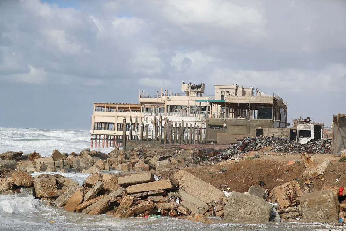 FILE PHOTO: The Alqalaa restaurant stands damaged, amid a ceasefire between Israel and Hamas, after a proposal by U.S. President Donald Trump for the U.S. to take over Gaza and displace its residents, in Gaza City February 6, 2025. REUTERS/Dawoud Abu Alkas/File Photo