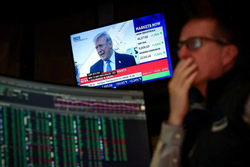 A trader works on the floor at the New York Stock Exchange in New York City, on March 23, 2026.