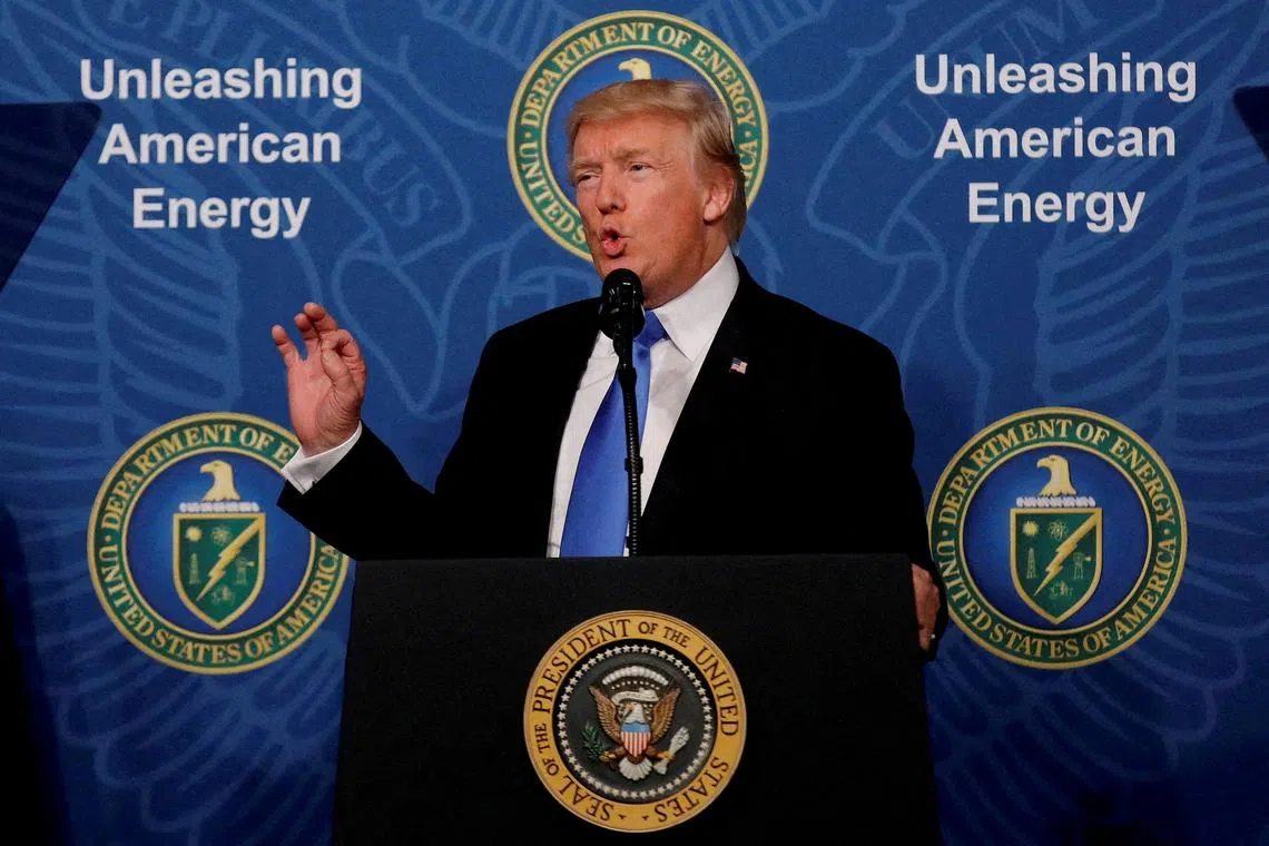 FILE PHOTO: U.S. President Donald Trump delivers remarks during an 'Unleashing American Energy' event at the Department of Energy in Washington, U.S., June 29, 2017. REUTERS/Carlos Barria/File Photo