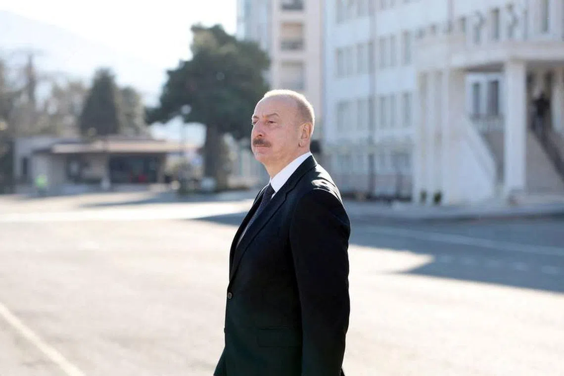 Azerbaijan's incumbent President and a candidate for ongoing Azeri presidential elections Ilham Aliyev walks out of a polling station after voting in Khankendi city, also known as Stepanakert by Armenia, following an Azeri military operation and a further mass exodus of ethnic Armenians from the region of Nagorno-Karabakh, Azerbaijan, February 7, 2024. Official website of the President of the Republic of Azerbaijan/Handout via REUTERS/File Photo
