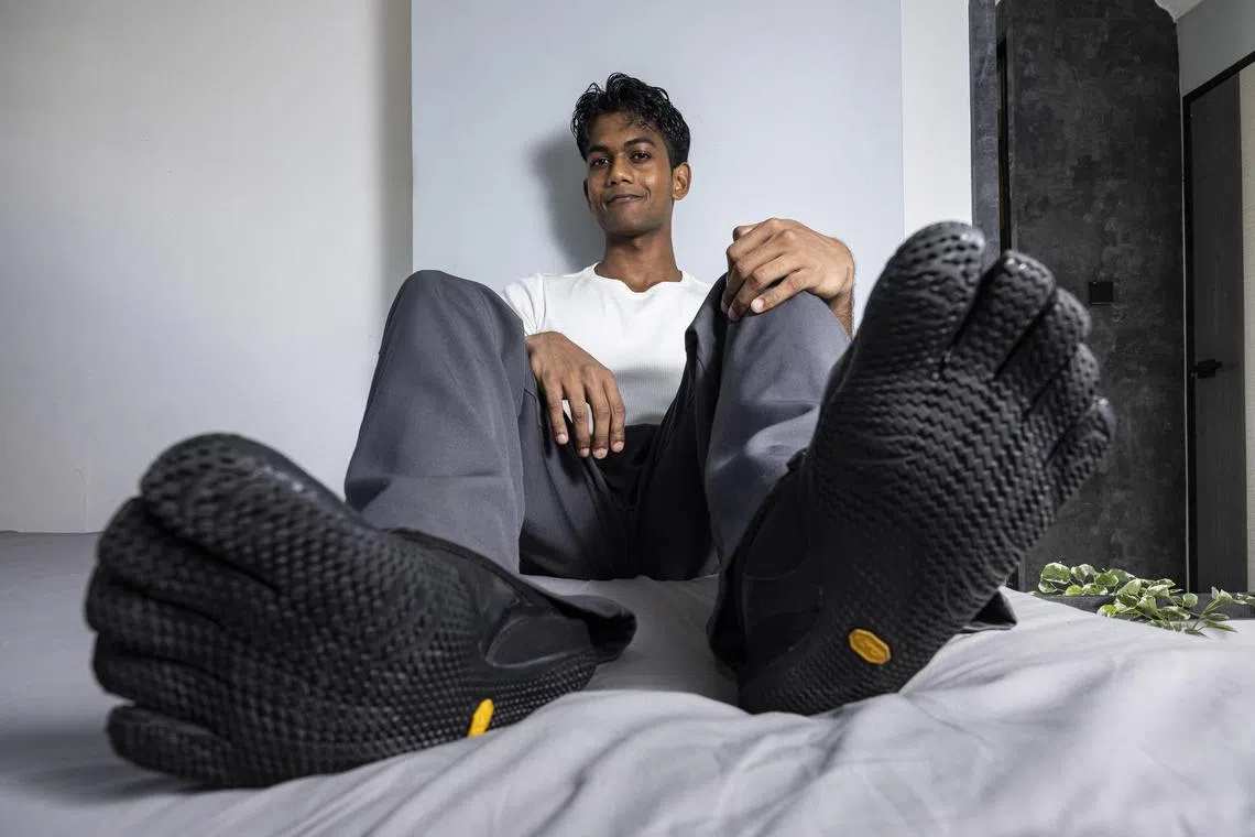 Sheearam S/O Karthigesan in his Vibram FiveFingers KSO EVO shoes at his home on Aug 26, 2025.