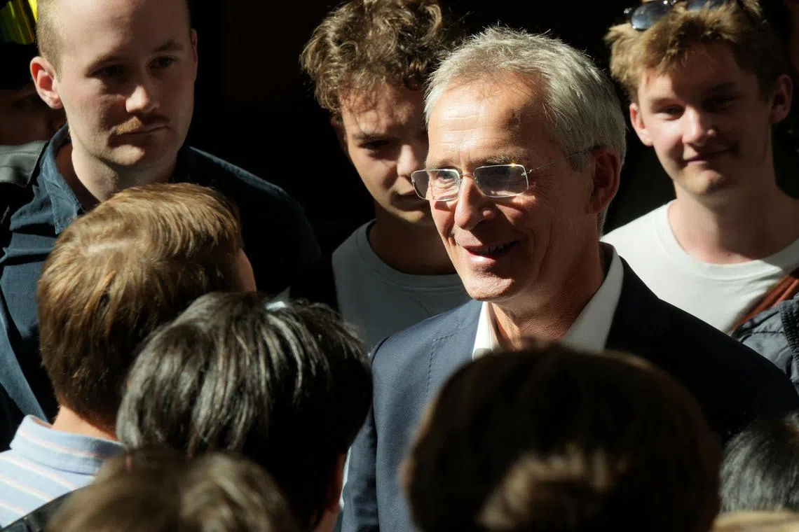 FILE PHOTO: Norwegian Finance Minister Jens Stoltenberg meets students after giving a speech at BI Norwegian Business School in Oslo, Norway, August 26, 2025. REUTERS/ Tom Little/File Photo