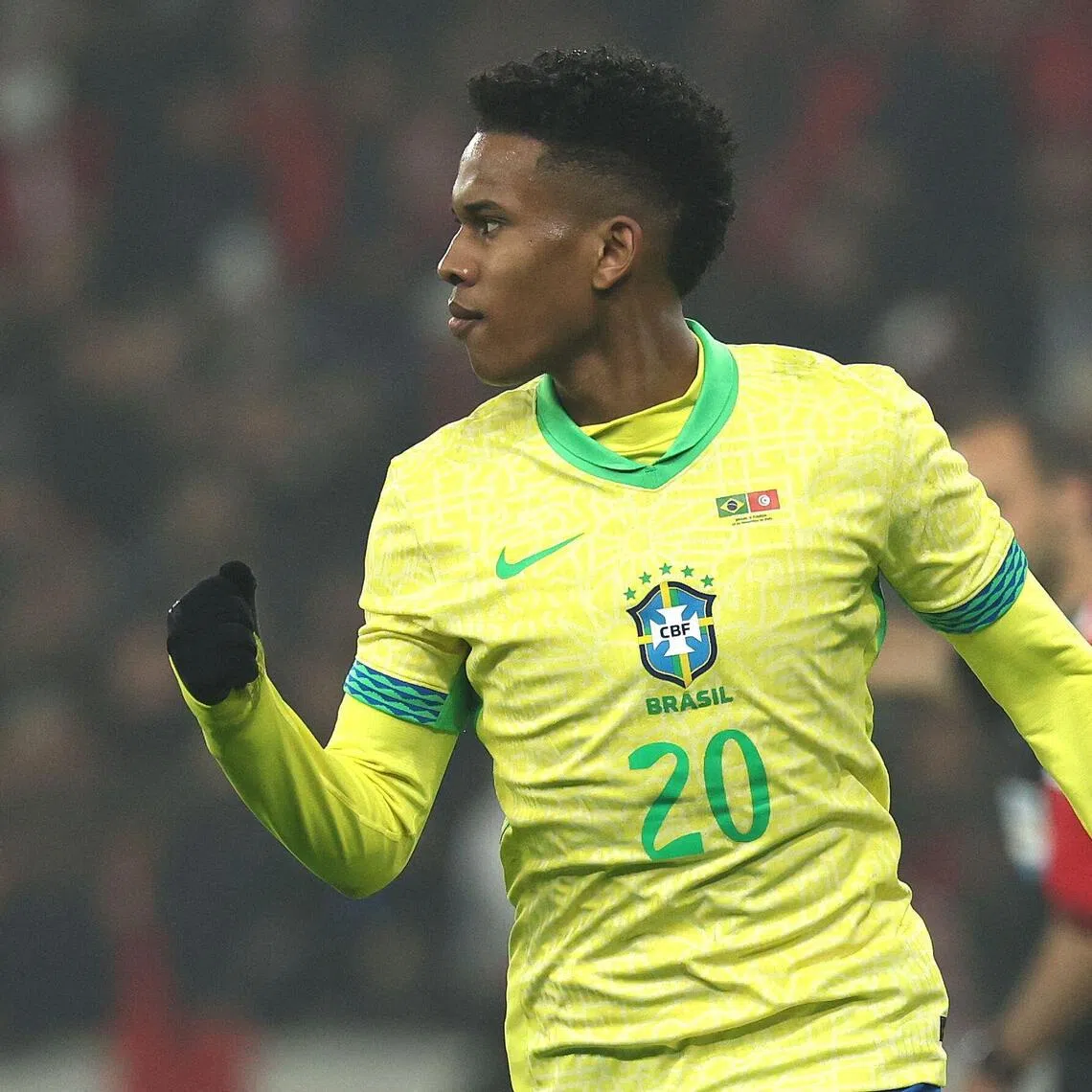 Brazil forward Estevao Willian celebrates after scoring the opener from the penalty spot during the 1-1 international friendly draw against Tunisia at the Stade Pierre-Mauroy in France on Nov 18, 2025.