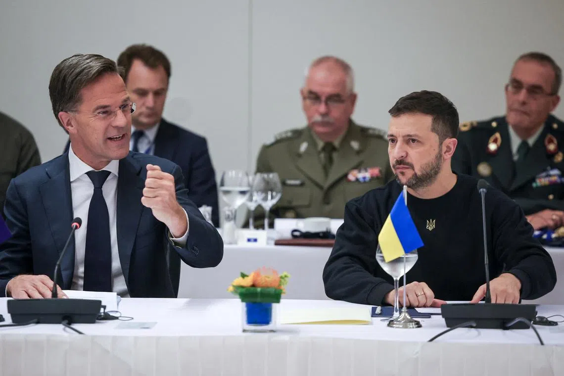 Ukrainian President Volodymyr Zelensky (left) attending a meeting with Nato Secretary-General Mark Rutte in Brussels, in October 2024.