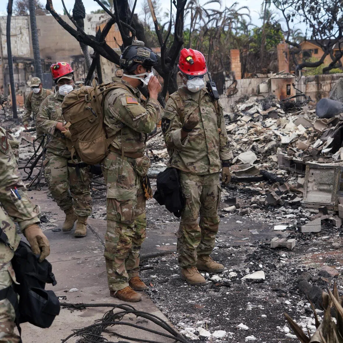 Emergency responders will need more than a week to work their way through hundreds of homes and burnt-out vehicles.