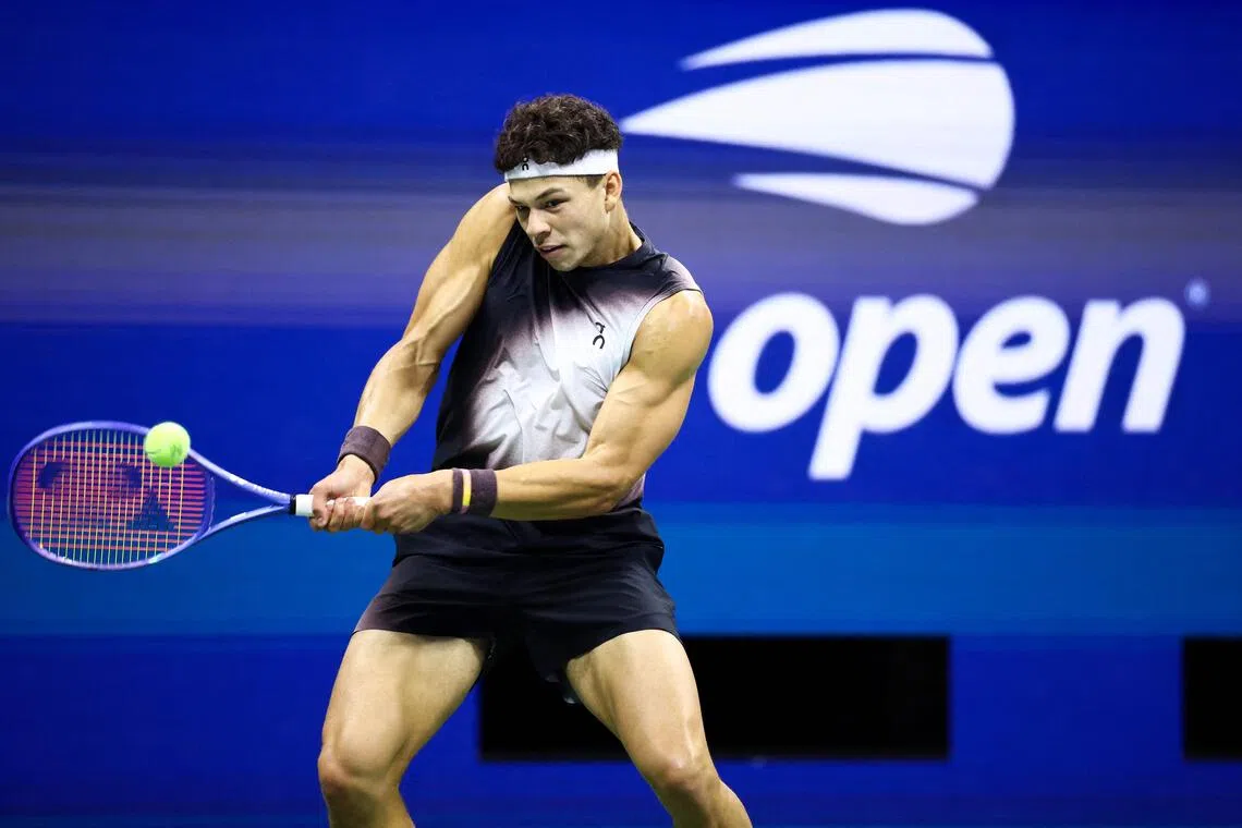 Ben Shelton returning the ball to fellow American Frances Tiafoe during their US Open semi-final on Sept 11.