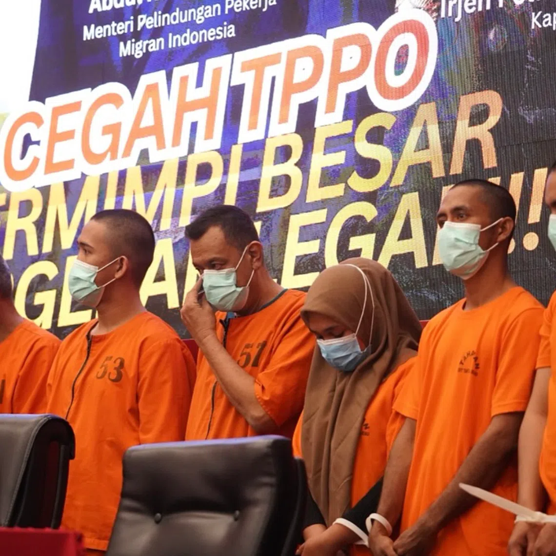 Human trafficking suspects at the Riau Police headquarters in Pekanbaru on July 17.
