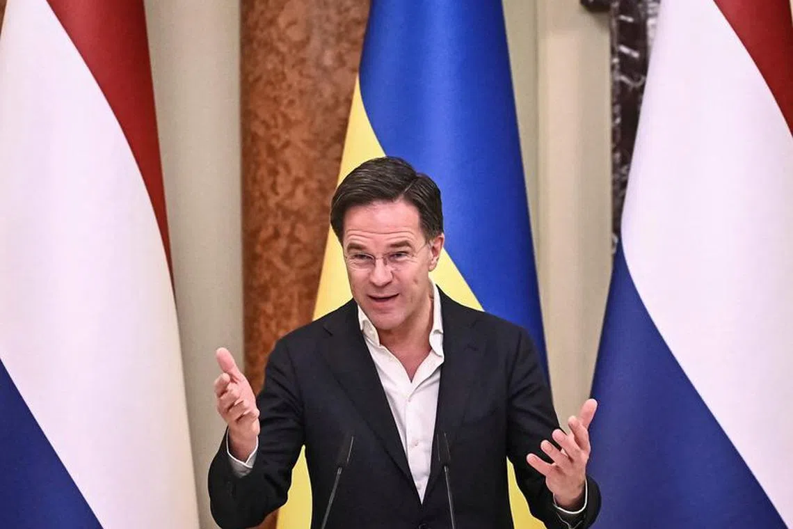 FILE PHOTO: Netherlands' Prime Minister Mark Rutte attends a joint news briefing with Ukraine's President Volodymyr Zelenskiy (not pictured), amid Russia's attack on Ukraine, in Kyiv, Ukraine February 17, 2023.  REUTERS/Viacheslav Ratynskyi/File Photo