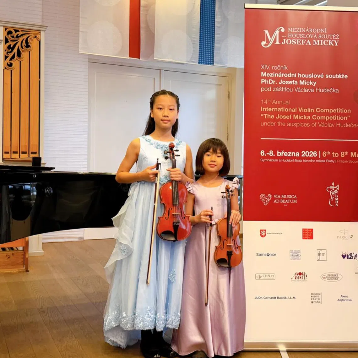 Rika (left), 11, and Celine, eight, were among 53 young musicians who took part in the Josef Micka Violin Competition.