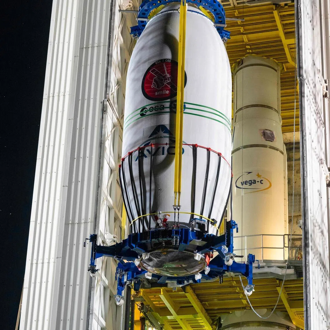 The Smile spacecraft lifted into place at the Vega launch site in Kourou, French Guiana.