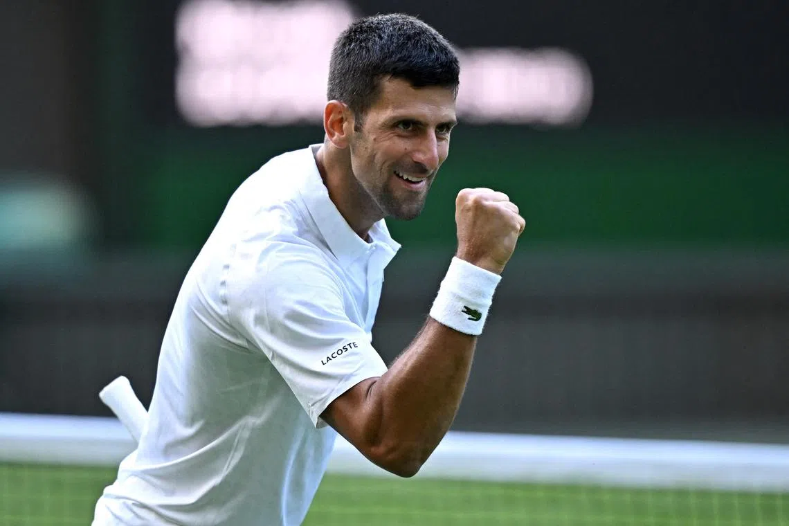 Serbia's Novak Djokovic celebrates after winning his second-round match against Australia's Jordan Thompson.