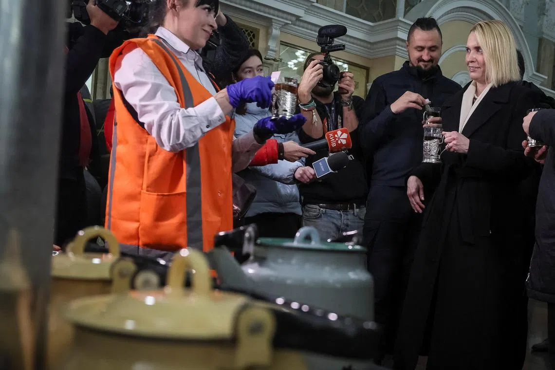 US Ambassador in Ukraine Bridget Brink visits central railway station in Kyiv, Ukraine, on Nov 25, 2022., where the United States Agency for International Development donates over 20,000 blankets for invincibility centres being set up across Ukraine.  
