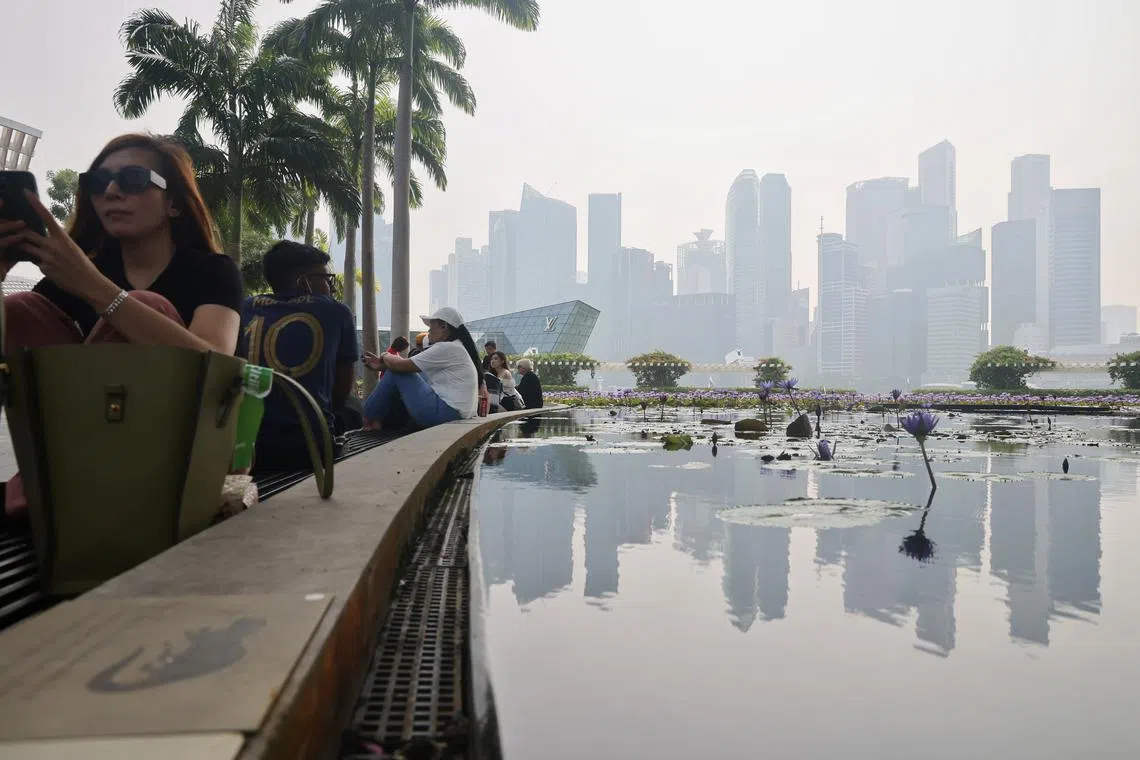 Hazy conditions at Marina Bay at around 3.15pm on Oct 7. The 24-hour PSI as of 3pm in the south was 95.