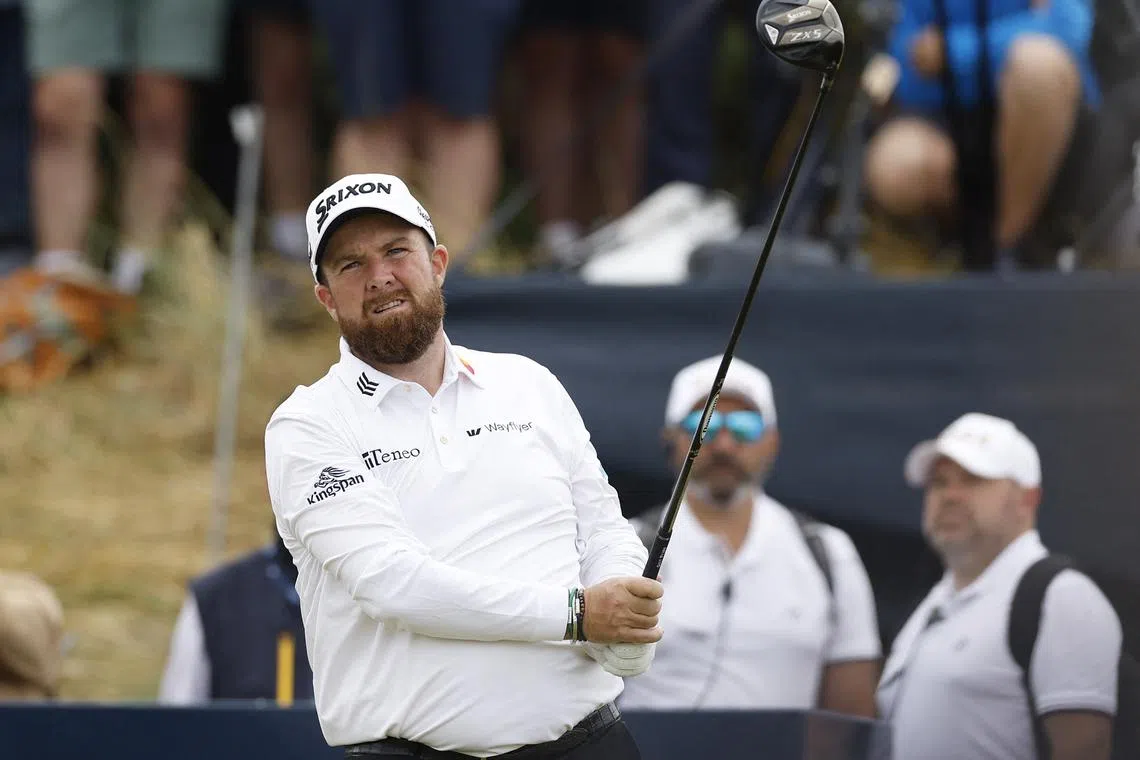Ireland's Shane Lowry watches his tee shot on the 10th hole during the second round.