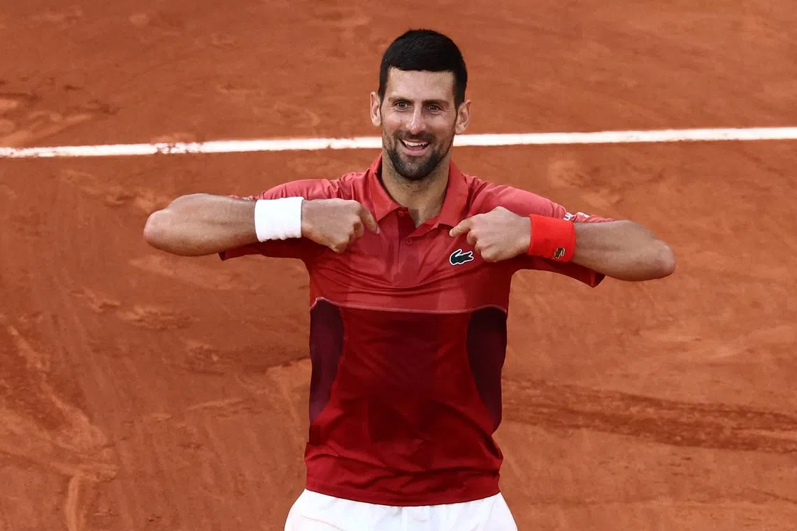 FILE PHOTO: Tennis - French Open - Roland Garros, Paris, France - June 3, 2024 Serbia's Novak Djokovic celebrates after winning his fourth round match against Argentina's Francisco Cerundolo REUTERS/Yves Herman/File Photo