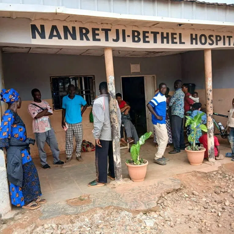 Relatives wait outside Nanetji-Betgel Hospital for family members undergoing treatment amid fears of reprisals after an attack that killed dozens of people in Mangu Local Government Area in Plateau State, Nigeria, August 18, 2026. REUTERS/Stringer