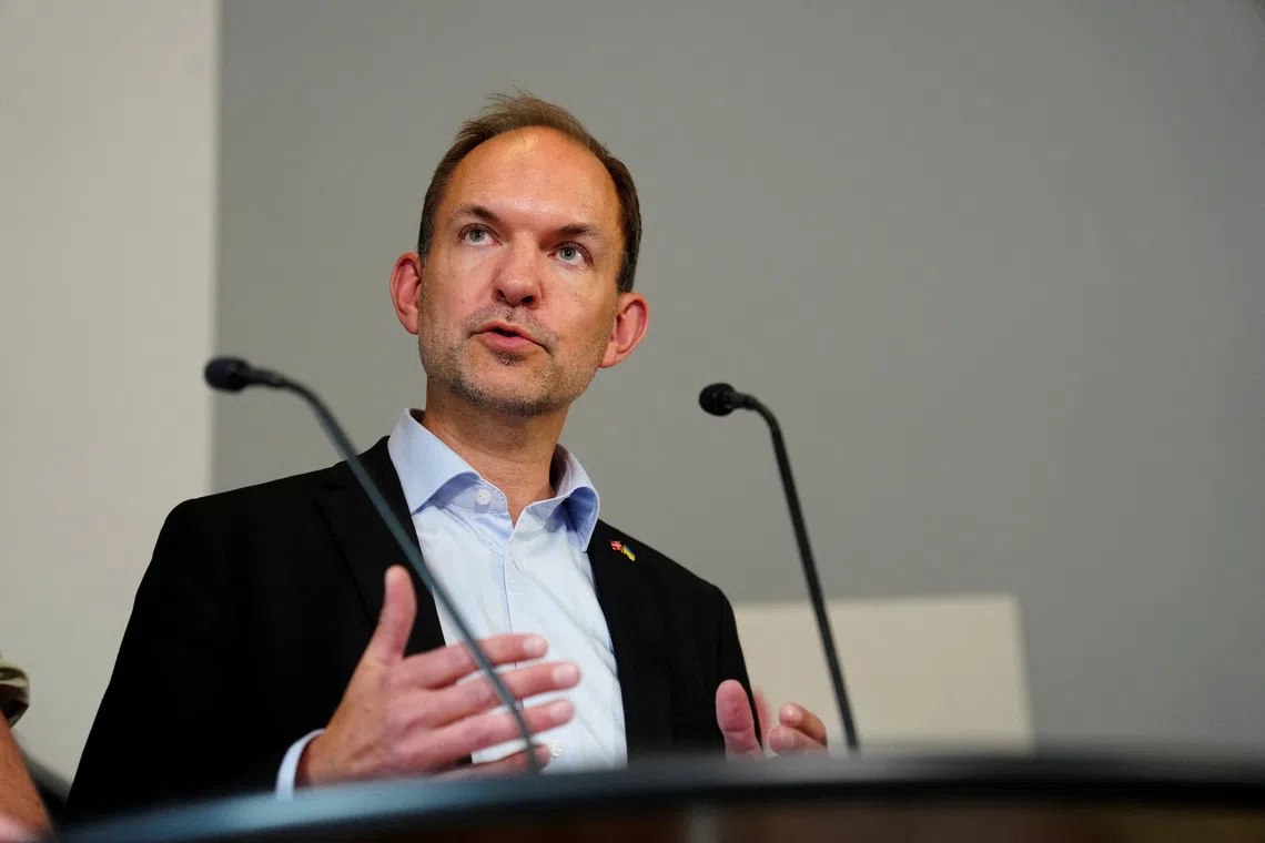 FILE PHOTO: Denmark's Defense Minister Jeppe Bruus comments on a report on alleged drone incursions in Denmark in the fall of 2025, at the Ministry of Defense in Copenhagen, Denmark, Friday, June 19, 2026.  Ritzau Scanpix/Sebastian Elias Uth/via REUTERS/ File Photo