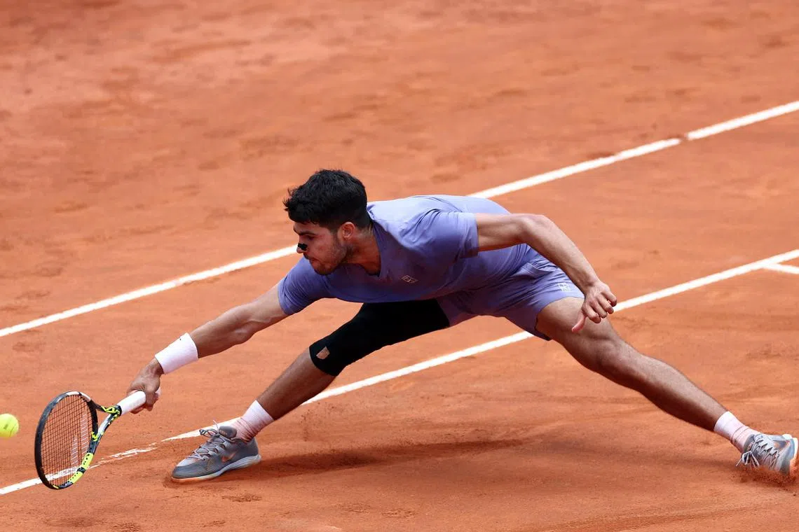 Spain's Carlos Alcaraz in action during his 6-3, 3-6, 7-5 Italian Open round-of-16 win over Russia's Karen Khachanov at Foro Italico in Rome on May 13, 2025.