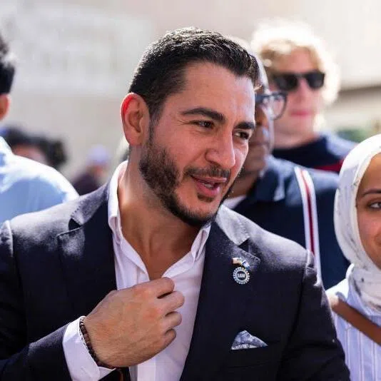 Michigan Democratic Senate primary winner Abdul El-Sayed with his wife, Sarah Jukaku, at a press conference in Detroit on Aug 5..