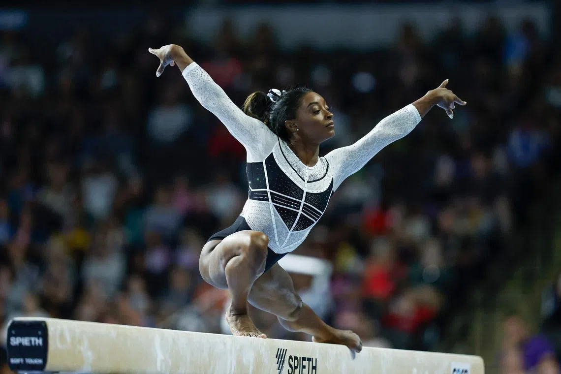 The United States' Simone Biles performing on the balance beam during the 39th edition of the US Classic gymnastics competition at Now Arena in Hoffman Estates, suburb of Chicago, Illinois, on Saturday.  It was the first time the four-gold former Olympic champion had competed since the Tokyo Games in 2021.
