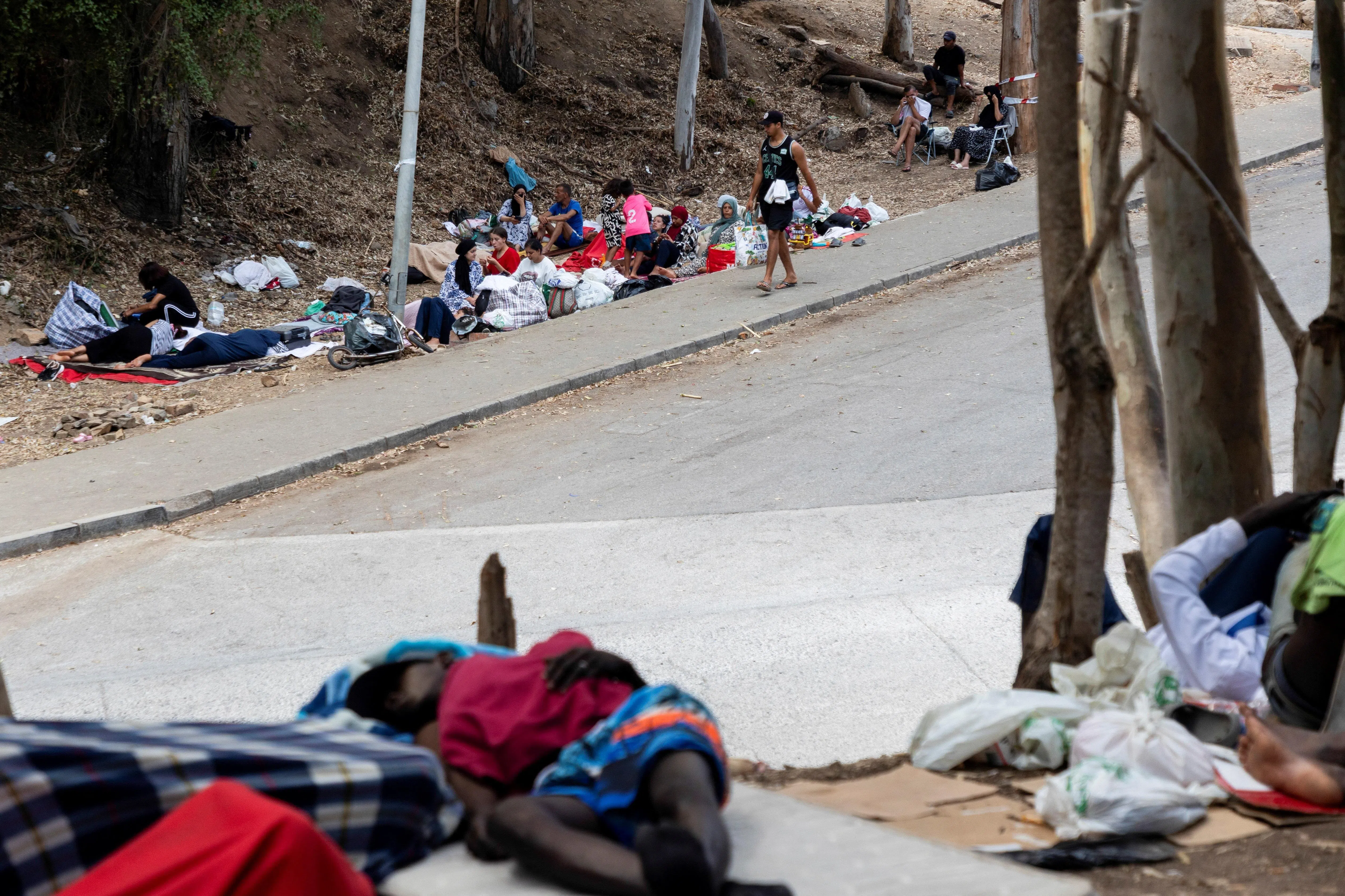 An estimated 5,000 to 8,000 migrants remain in Ceuta following a mass border crossing two weeks ago that saw over 72,000 people surge into the tiny territory of 80,000.