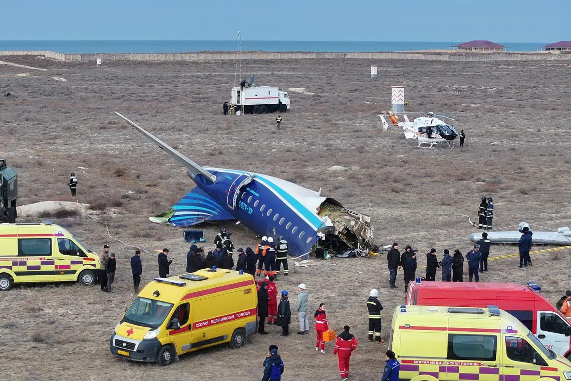 A drone view shows emergency specialists working at the crash site of an Azerbaijan Airlines passenger plane near the city of Aktau, Kazakhstan December 25, 2024. REUTERS/Azamat Sarsenbayev/File Photo