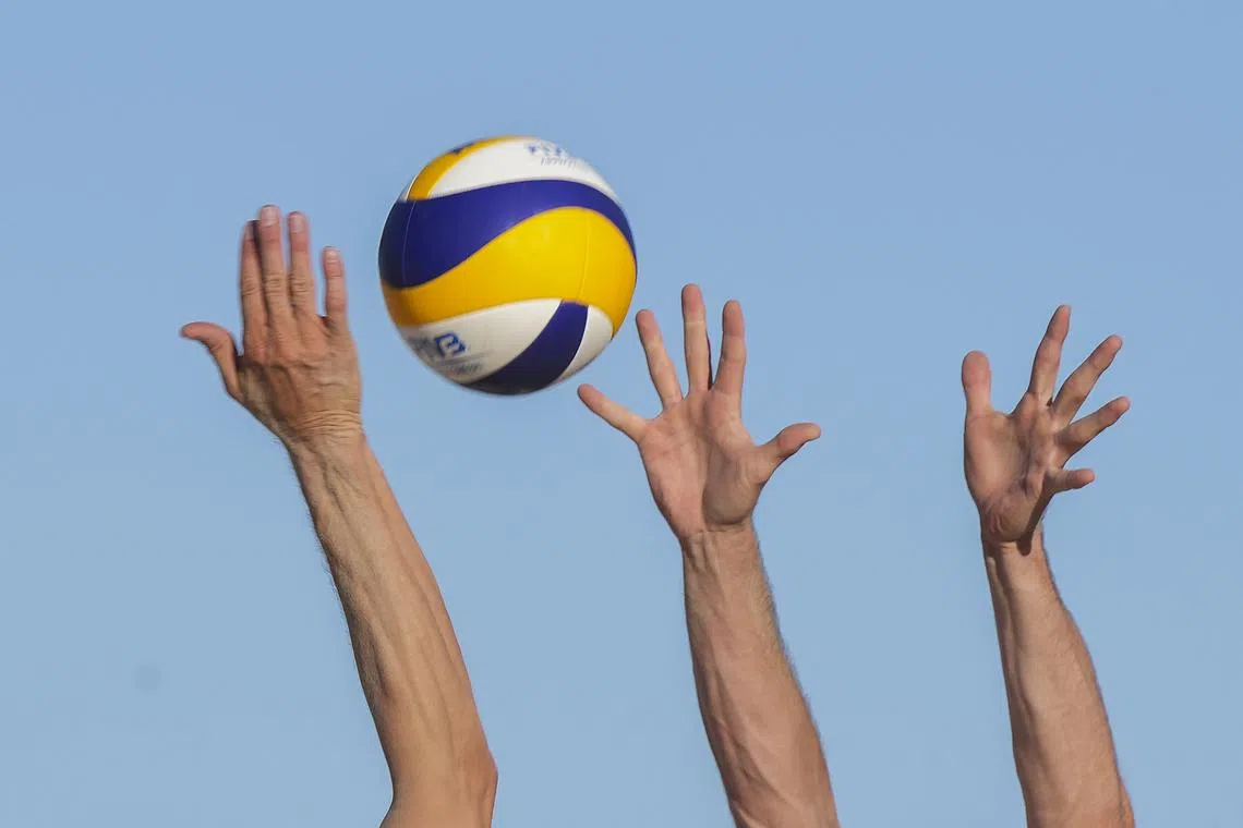 Robin Seidl of Austria (L) in action against Mathias Berntsen of Norway (R) during the Volleyball World Beach Pro Tour in Cape Town, South Africa, 03 November 2022. 1000 cubic meters of beach sand were used to construct the courts on Cape Town's iconic Grand Parade. The Beach Pro Tour is the worldwide professional beach volleyball tour organised by Volleyball World and the FIVB. 