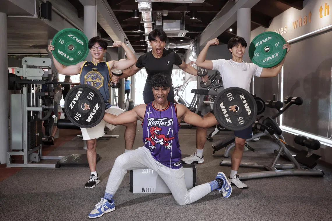 (Clockwise from bottom) Sabesan Tamilvanan, Jason Lim, Jake Aung, and Rico Wong, 17-year-old friends  at Woodlands ActiveSG Gym.
More teens are signing up for personal training and starting gym routines early, some as young as 13 years old. Several gyms reported an increase in number of teenage gym-goers in the last five years, attributing it to social media and peer influence.