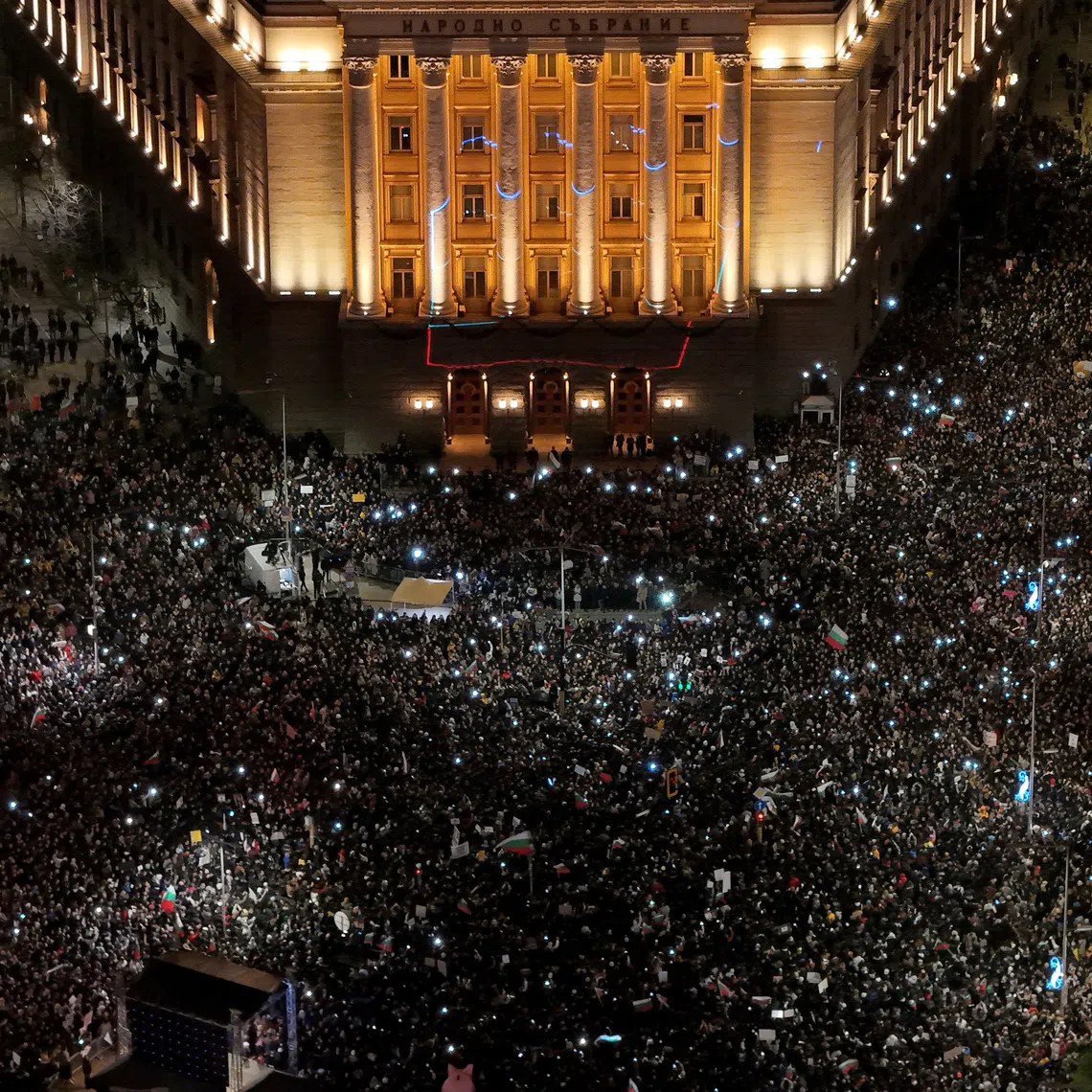 A drone view shows protesters gathering during a demonstration organised by Bulgaria’s opposition PP-DB coalition against the proposed financial framework of the country's budget, outside the parliament, in Sofia, Bulgaria, December 1, 2025. REUTERS/Spasiyana Sergieva