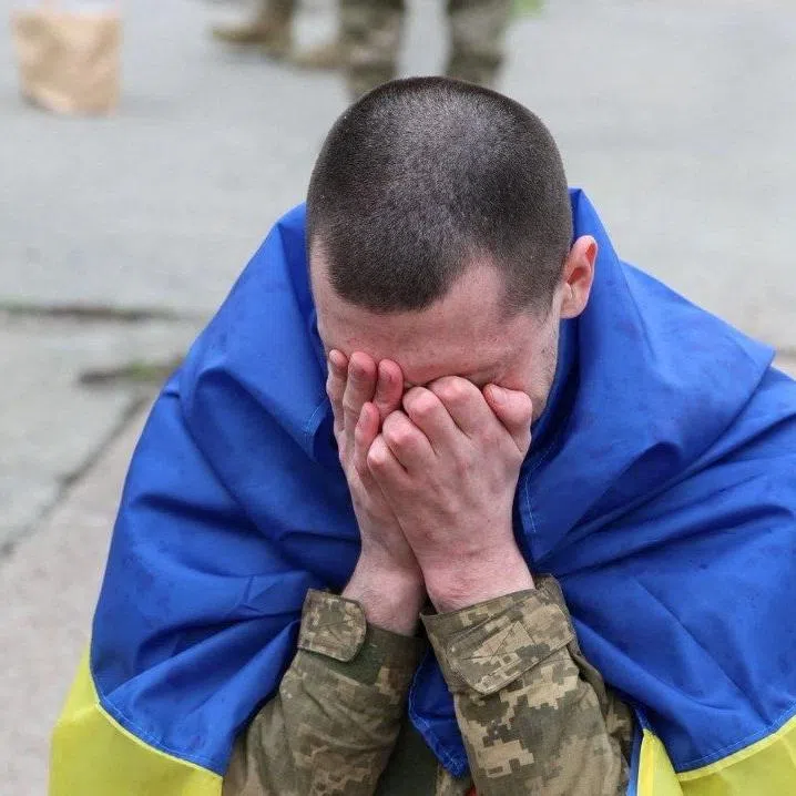 A Ukrainian prisoner of war (POWs) reacts after a swap, amid Russia's attack on Ukraine, at an unknown location in Ukraine, in this handout picture released April 11, 2026. Ukraine's President Volodymyr Zelenskiy via Telegram/Handout via REUTERS