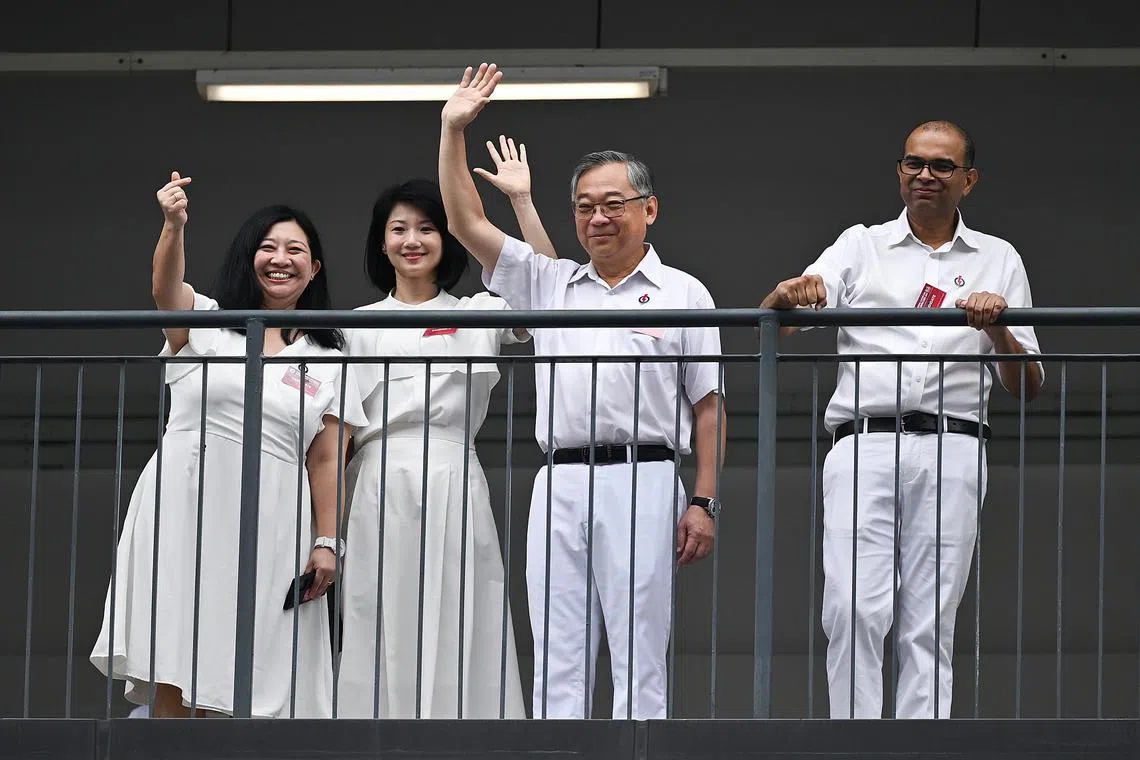 DPM Gan Kim Yong (second right) with PAP's Punggol GRC team (from left) Ms Yeo Wan Ling, Ms Sun Xueling and Dr Janil Puthucheary at Yusof Ishak Secondary School on April 23.