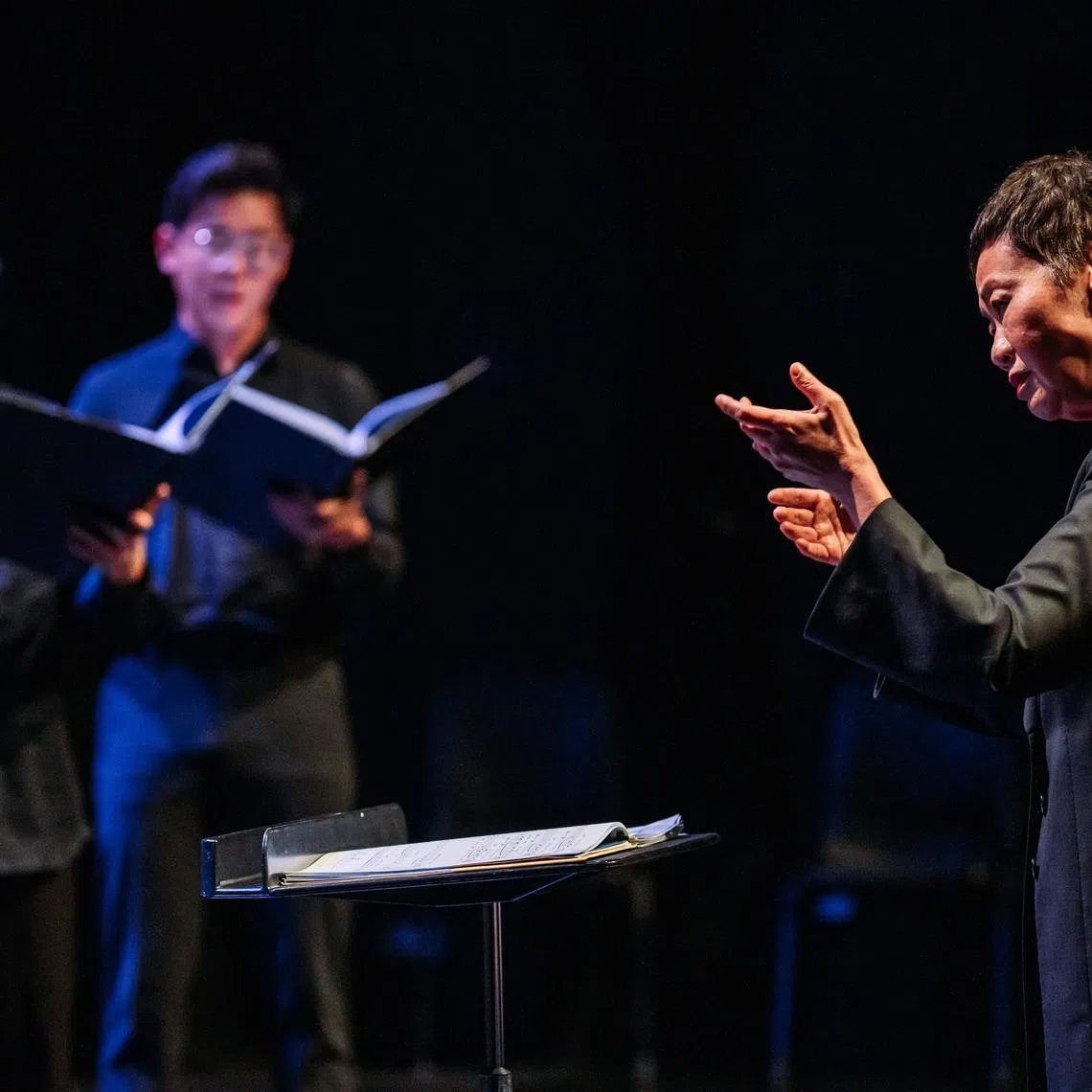 Cultural Medallion recipient Jennifer Tham leads the SYC Ensemble Singers.