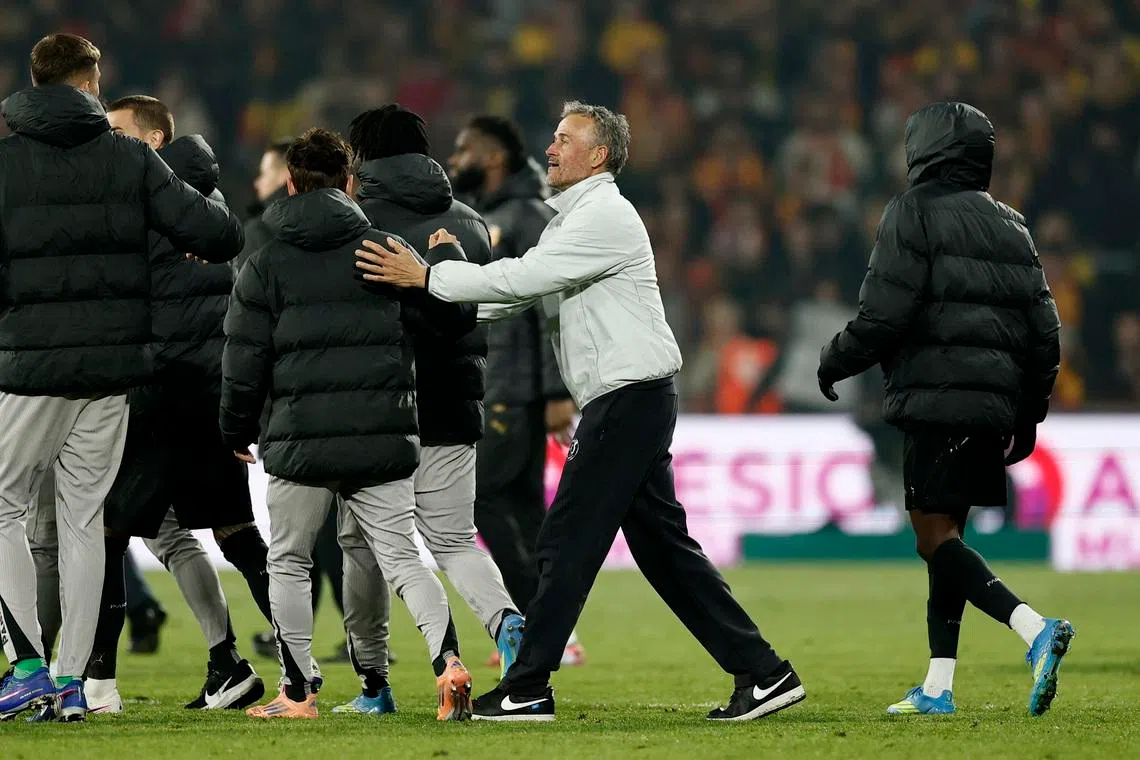 Soccer Football - Ligue 1 - RC Lens v Paris St Germain - Stade Bollaert-Delelis, Lens, France - May 13, 2026  Paris St Germain coach Luis Enrique celebrates after winning Ligue 1 REUTERS/Benoit Tessier