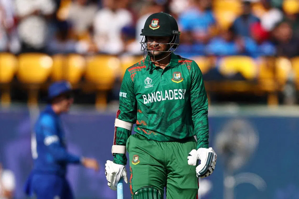 FILE PHOTO: Cricket - ICC Cricket World Cup 2023 - England v Bangladesh - Himachal Pradesh Cricket Association Stadium, Dharamsala, India - October 10, 2023 Bangladesh's Shakib Al Hasan reacts after getting bowled out by England's Reece Topley REUTERS/Andrew Boyers/File Photo