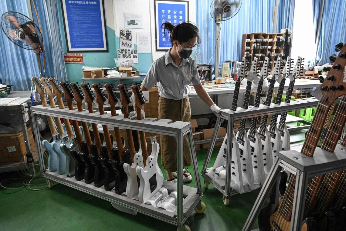 straitstimes.com - Chinese guitar capital's stairway to export heaven