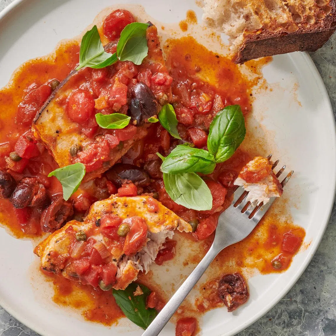 Swordfish with tomatoes. For a New York Times writer, a weeknight tradition is the perfect way to cook with his sons.