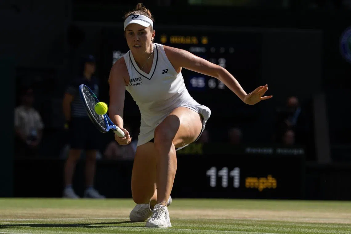 Jul 11, 2026; London, United Kingdom; Linda Noskova of the Czech Republic returns a shot during the women’s singles final against Karolina Muchova of the Czech Republic on day 13 at All England Lawn Tennis and Croquet Club.  Mandatory Credit: Susan Mullane-Imagn Images