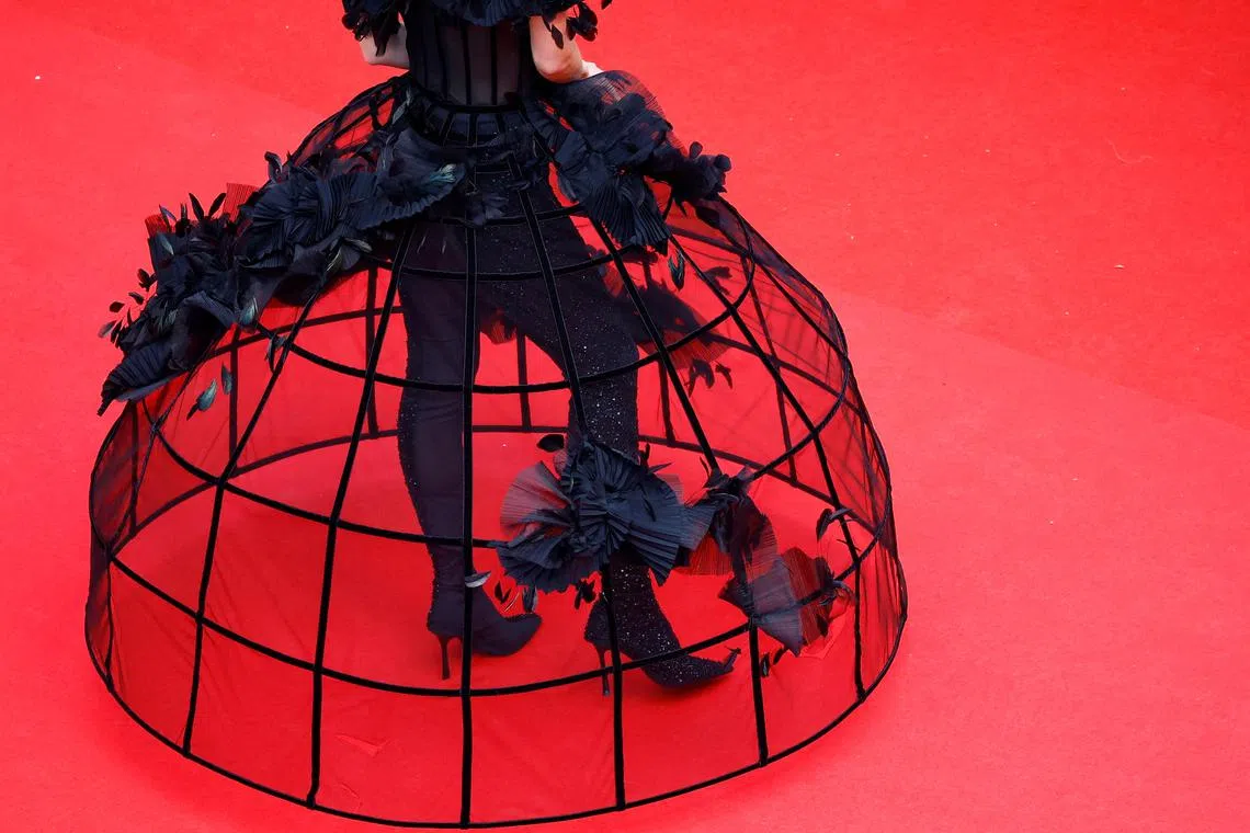 Russian actress Polina Pushkareva posing on the red carpet during arrivals for the screening of the film "L'Amour ouf" (Beating Hearts) at the 77th Cannes Film Festival in Cannes, France, on May 23, 2024. 